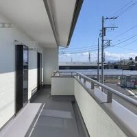画像1676：静岡市清水区の注文住宅｜バルコニーの外壁にウッド調アクセント使用のデザインがお洒落